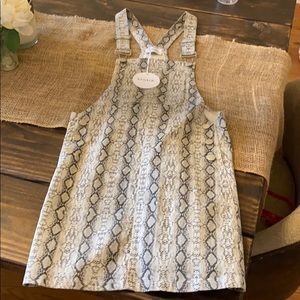 Snake print mini skirt overall.